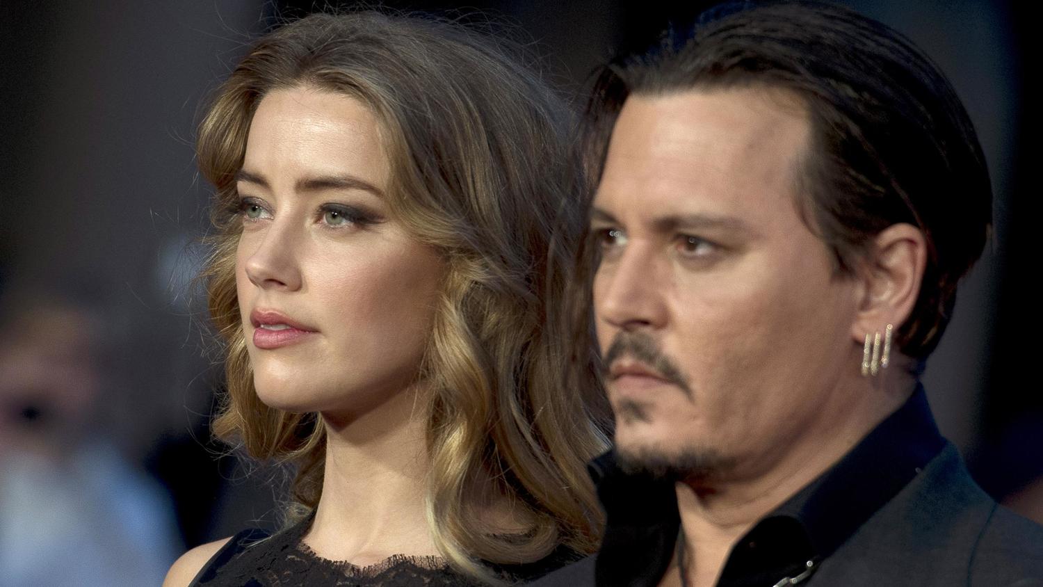 Amber Heard ja Johnny Depp.
